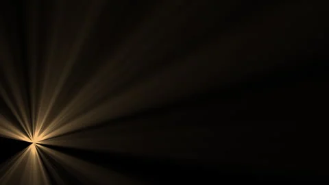 A beam of light with a beautiful color moves in the darkness. Stockbeeldmateriaal 312974430