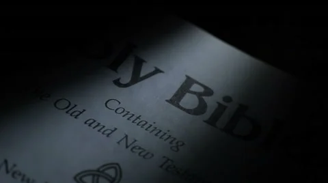 A Beam Of Light On The Bible At Night Video stock 49735186