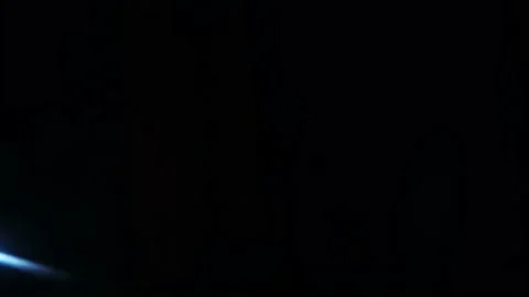 Beam of light leaks out, blurs towards corner of frame. Stock Footage 234337631