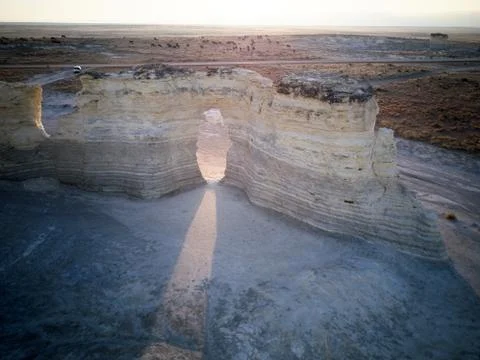 Beam of light shining through Monument Rocks Stock Photos