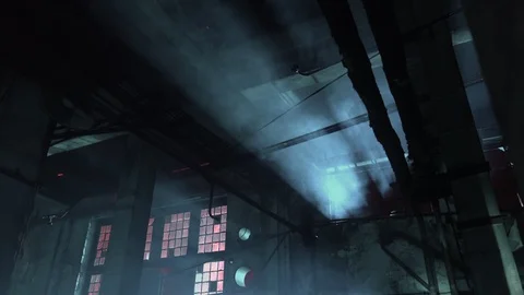 Beam of light shining through window in dark abandoned industrial complex Stock Footage 123678187