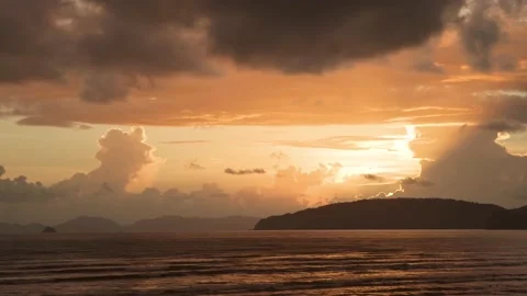 Beam light sunset against cloudy sky with sea landscape in evening Stock Footage 153507223