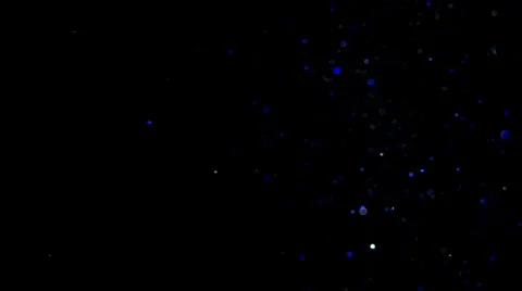 Beam of Light Through Colored Floating Particles Stock Footage 29266603