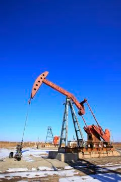 Beam pumping unit Stock Photos