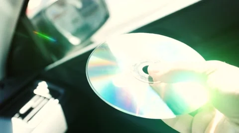Beam of the sun is reflected in a compact disk and reflected as in a mirror Stockbeeldmateriaal 53112879