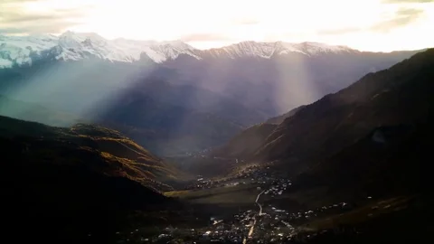 Beam of sunset light in autumn mountains with snow timelapse. svaneti, georgia 스톡 동영상 77688148