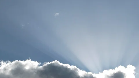 Beaming Sunlight Behind Clearing Cloud Time Lapse Stock Footage 97960710
