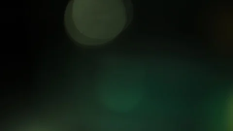 Beams, bokeh, light, glare on a dark background Stock Footage 129165848