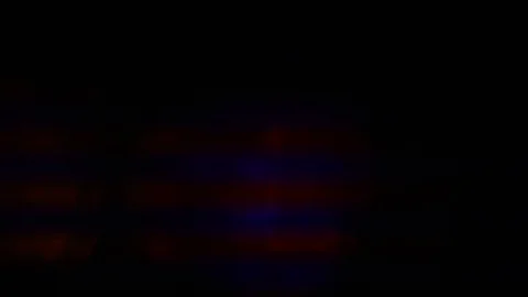 Beams, bokeh, light, glare on a dark background Stock Footage 129166121