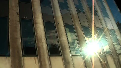 Beams of sunlight on window lens flare left to right camera Stock Footage 8687002