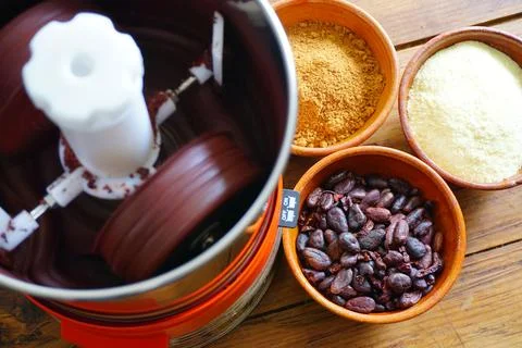 Bean to bar milk chocolate making at home with chocolate refiner Stock Photos