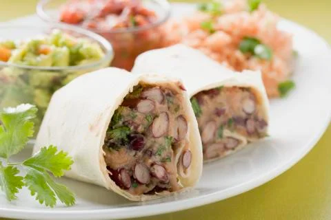 Bean burritos with accompaniments (Mexico) Stock Photos