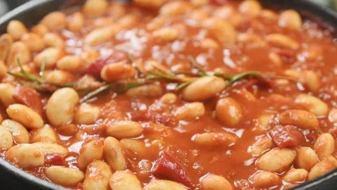 The bean casserole is boiling into the frying pan. Stock Footage 202177007