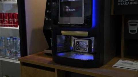 Bean-to-cup coffee machine in micromarket Stock Footage 237464230