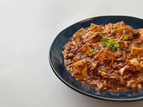 Bean-curd soup topped with red bean paste Stock Photos