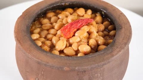 Bean dish in pottery vessel Stock Footage 257119670