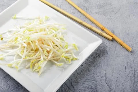 Bean sprouts in white plate. Stock Photos