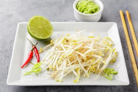 Bean sprouts in white plate. Stock Photos