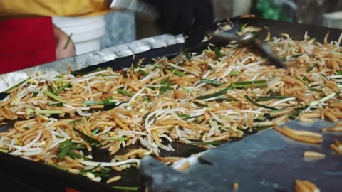 Beans are fried in the street Stock Footage 132081492