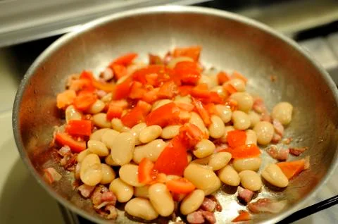 Beans baked with bacon Foto stock