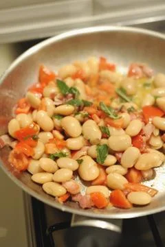 Beans baked with bacon Foto stock