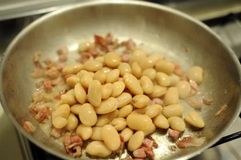Beans baked with bacon Foto stock