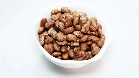 Beans on bowl that rotates Stock Footage 86364507