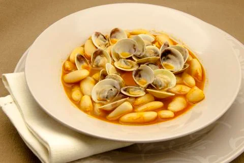 Beans with clams Stock Photos