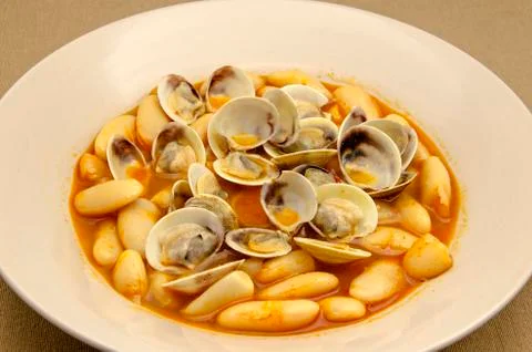 Beans with clams Stock Photos