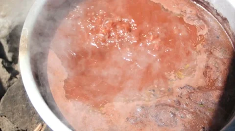 Beans cooking over open fire Vídeos de archivo 54708356