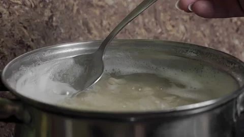 Beans Cooking Process White bean seeds in boiling water in a saucepan. Vídeo Stock 145122389