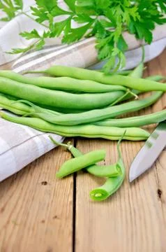 Beans green on the board Stock Photos