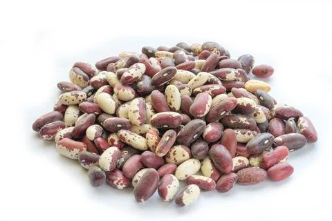 Beans kernels on a white background heap close-up Stock Photos