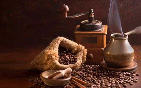 Beans in a sack on dark background, top view Stock Photos