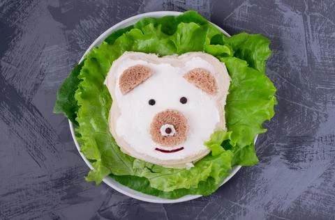 Bear cub, sandwich for kids with wheat bread and cheese Stock Photos