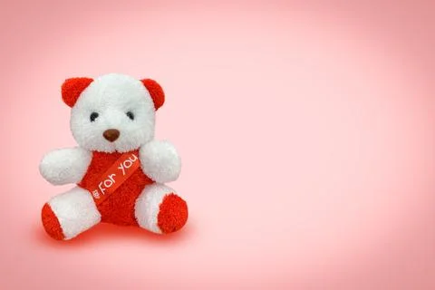 Bear doll sitting with pink background, Stock Photos