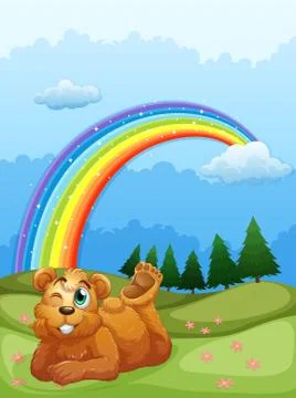 A bear at the hill with a rainbow in the sky Ilustración de archivo