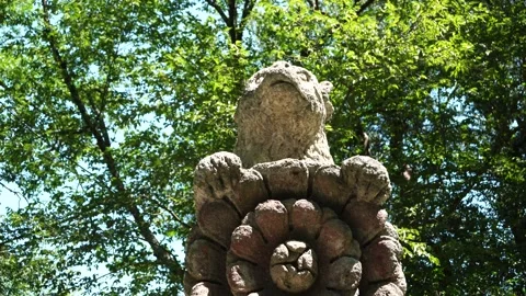 Bear sculpture between trees in the Park of the Monsters of Bomarzo Stock Footage 168385198