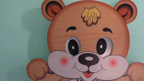 Bear toy wall clock with moving eyes Stock Footage 89580550