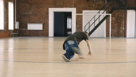 Beard breakdancer dancing in sport gym Video stock 79104204