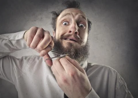 Beard cutting Stock Photos