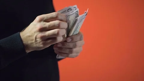 Beard Man in Black Counts Dollars Banknotes Видео 69970481