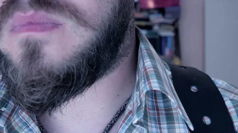 Beard Scratching with gun Stock Footage 66060579