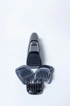 Beard trimmer on a white background.  Stock Photos