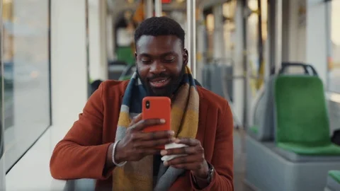 Bearded afro-american businessman using smartphone content suffering flu Stock Footage 121473743