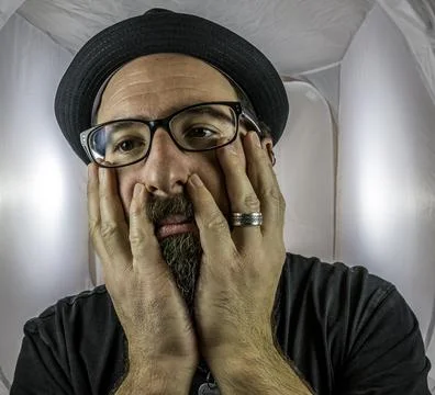 A bearded and desperately looking man with empty eyes Stock Photos