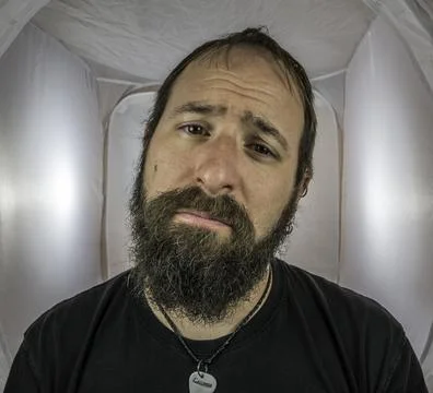 A bearded and sad looking man in a depressive mood Stock Photos