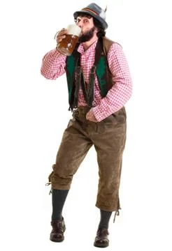 Bearded, bavarian guy drinking wheat beer Stock Photos