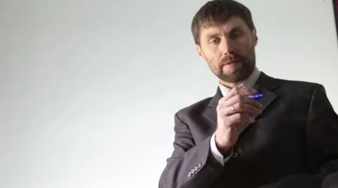 Bearded businessman draws the schedule, circuit block and diagram Stock Footage