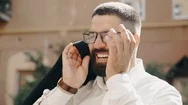 Bearded Businessman With Glasses Smiling On The Street Stock Footage